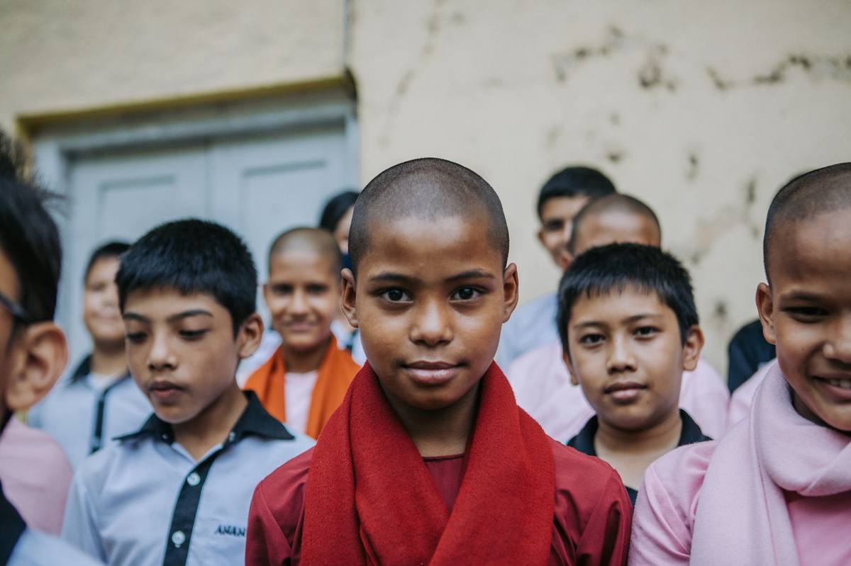 Young monastics gathered at a school supported by The Maitri Project